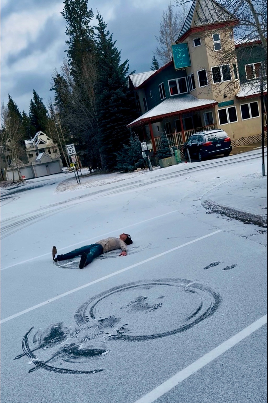 Snow angels in the parking lot in front of the Frisco Inn on Galena