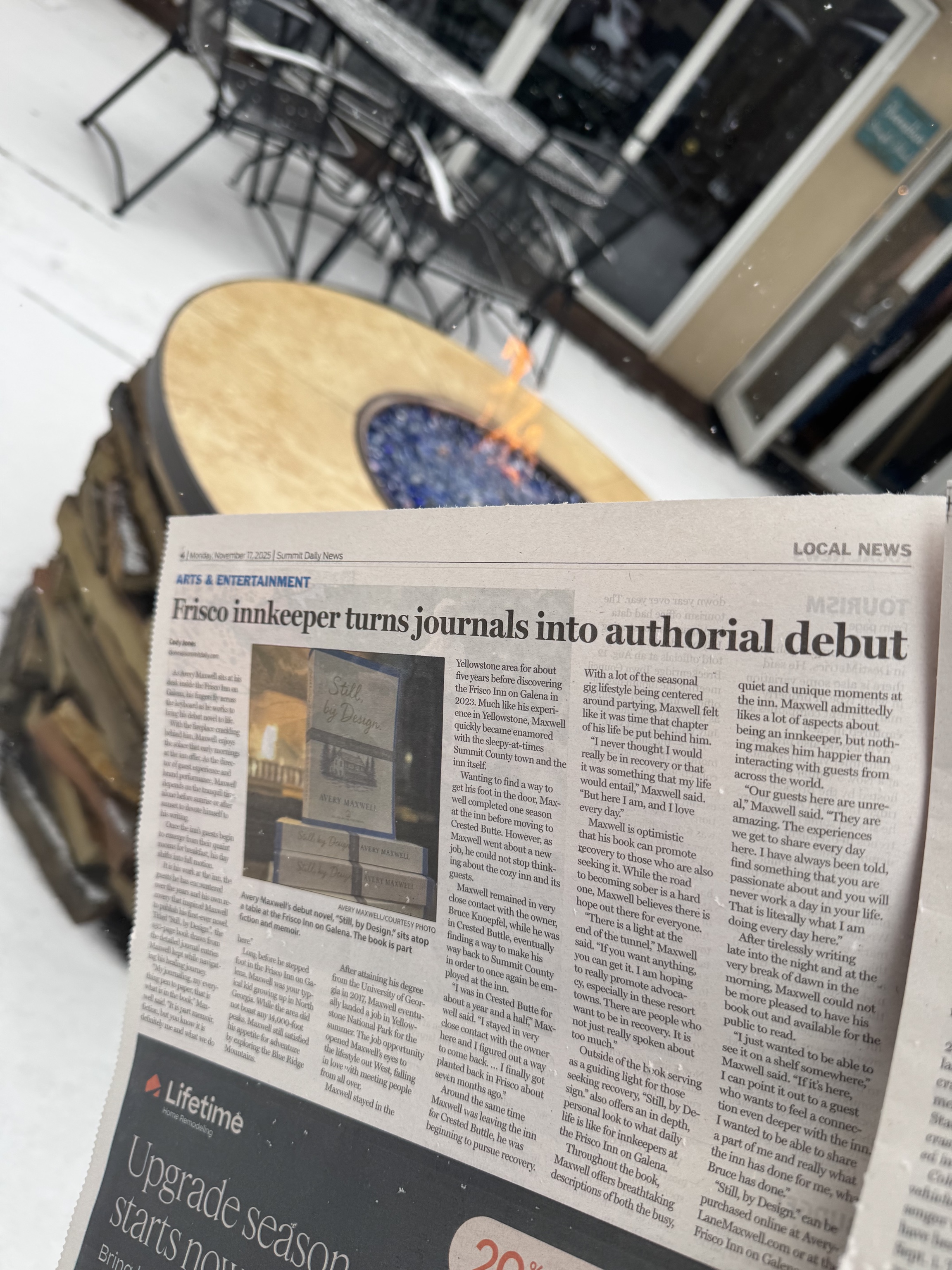 Summit Daily News article about Still, by Design held over a firepit table in the snow