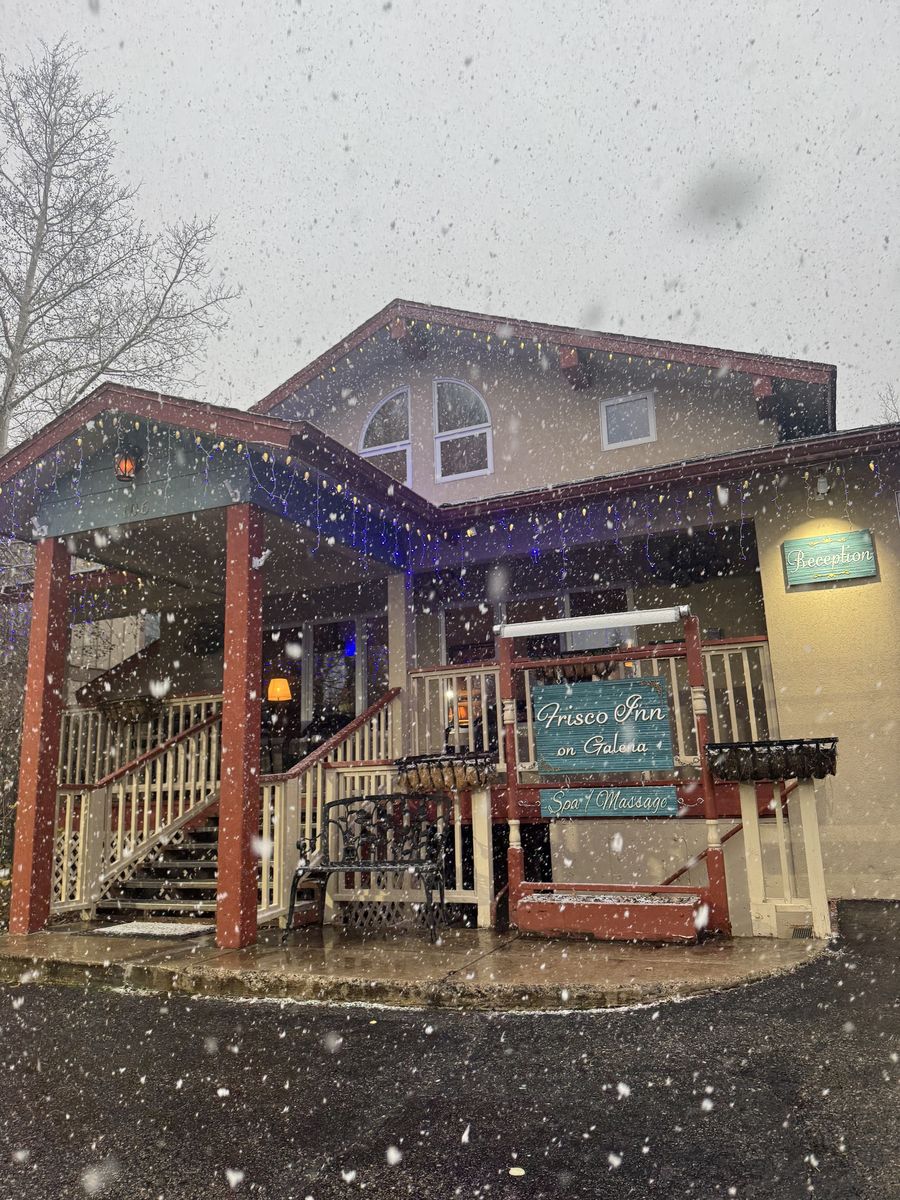 The Mt. Royal Candle, the Frisco inn glowing in snowfall